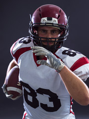 American football Player running with the ball