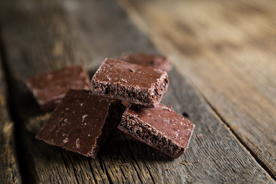 Pieces of dark porous chocolate