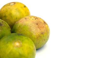 close up of lime lemon isolated on white