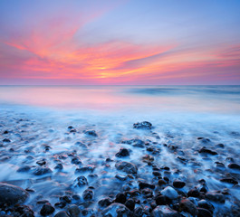Panele Szklane  Sunset by the Sea, Waves rolling in, long exposure, Atlantic Ocean, Normandy, France