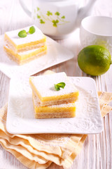 Lime cooler bars with icing sugar