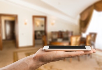 Hand holding mobile phone