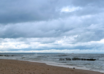 Sea coast. Waves and storms at sea. Waves on the Baltic Sea.