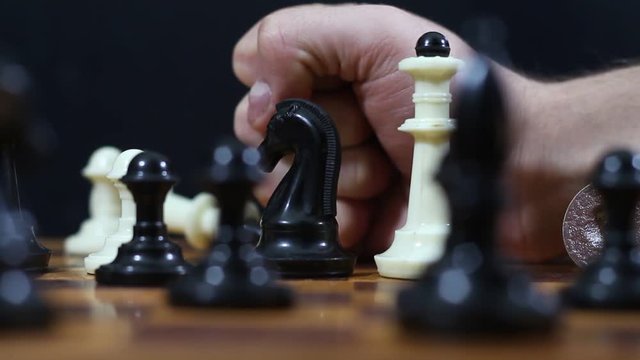 Game of chess. Friends in the competition play chess. World Chess Tournament. Victory and defeat. Checkmate. Bracing. King and Queen.