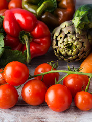 Assortment of fresh italian vegetables on wooden table