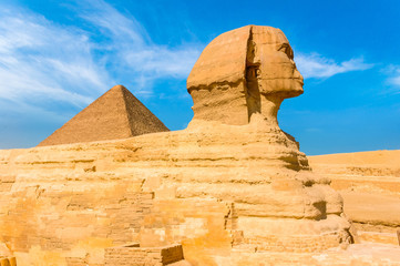 Fototapeta na wymiar Egyptian sphinx. Cairo. Giza. Egypt. Travel background. Architectural monument. The tombs of the pharaohs. Vacation holidays background wallpaper