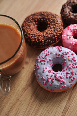 delicious coffee and delicious donuts