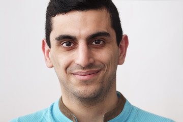 Fototapeta premium Close-up of a happy middle eastern man's face,