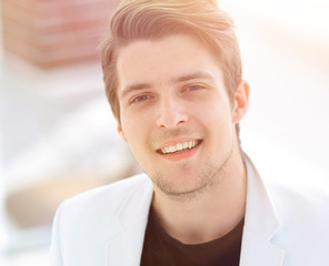 handsome man in white jacket.