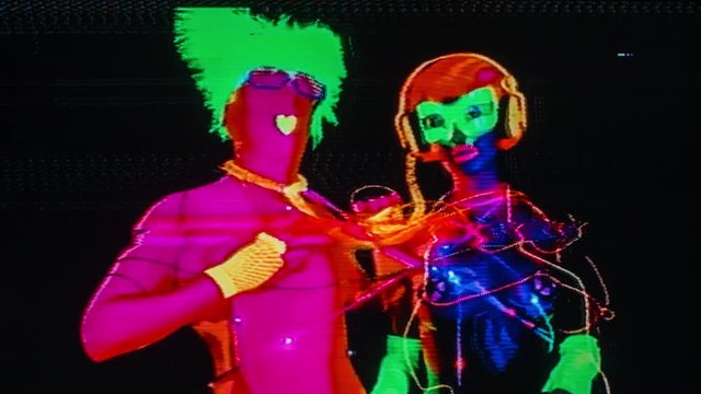 glow raver man and woman tied up together with led cables, filmed in fluorescent clothing under UV black light. this version has overlayed video distortion and glitch effects