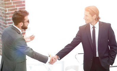 welcome and handshake of business partners