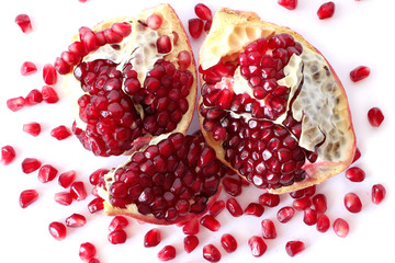 pomegranate seeds isolated on white background, view from above. Vegetarian Concept, Organic Vitamins. Organic and Benefit Garnet Fruit.