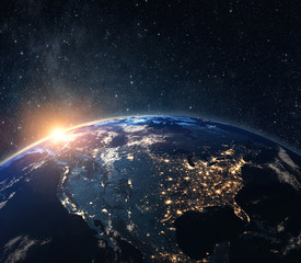 Fototapeta premium Planeta Ziemia z kosmosu w nocy. Niektóre elementy tego zdjęcia dostarczone przez NASA