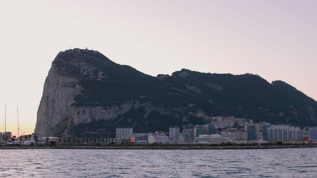 View of Gibraltar from board of sailing yacht during sunrise