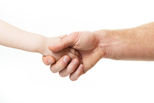 Hands, deal time. Father's and his son's hands. Dad and kid hands over white. Male and children hands closep, isolated on white background.