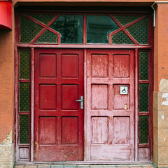 Vintage wooden red door.