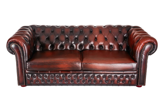 Classic old chesterfield sofa isolated on white background