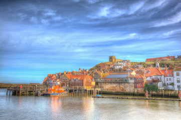 Naklejka premium Whitby harbour and Abbey North Yorkshire England uk in colourful HDR