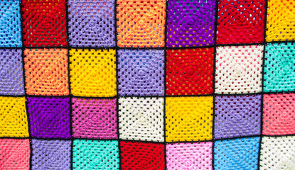 multi-colored knitted blanket