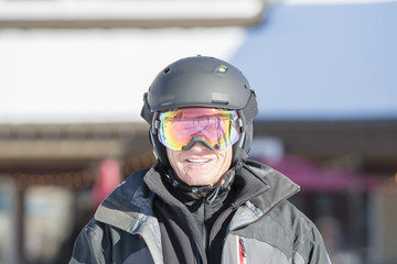Older Man Ready to Ski with all Safety Gear at a Colorado Ski Resort