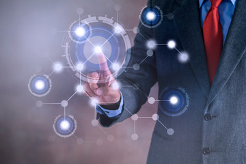 Businessman working on a virtual screen of the future. Internet and network concept