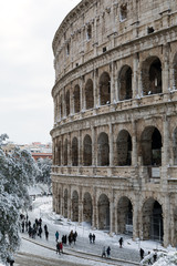 Snow covers the streets of Rome, Italy. Piazza del Colosseo comes alive with hundreds of people who went to celebrate the event.