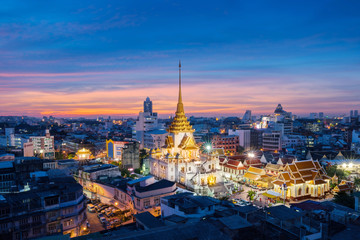 Bangkok, Thailand : 2017,NOV 27 - Wat Trimitr in Chinatown in sunset at Bangkok, Thailand.
