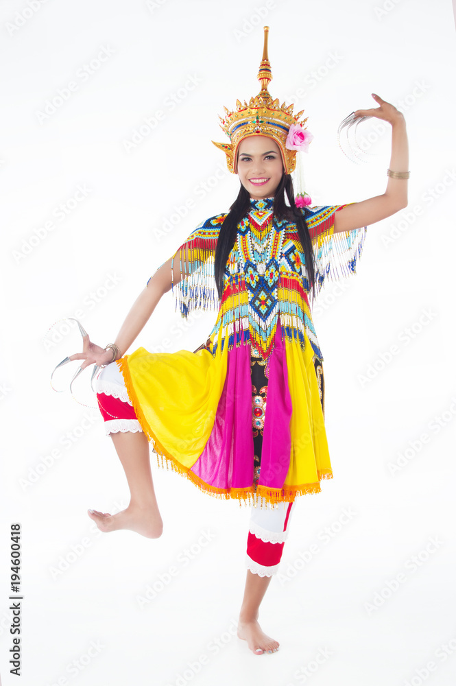 Wall mural The lady in Southern thai classical dancing suit is posing on white background.