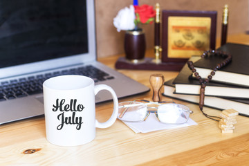 muslim desktop and hello july concept