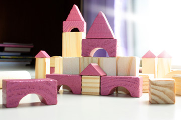 Wooden building blocks. Kids room. Child's play.