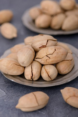 Close-up pecan nuts in plate