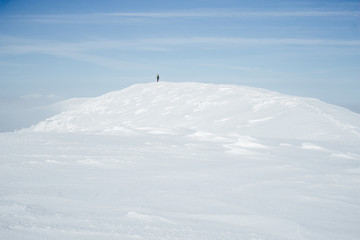 Naklejka na ściany i meble Alone climber standing on hill in Gorgany mountains