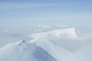 View of white Gorgany mountains and cloudy sky