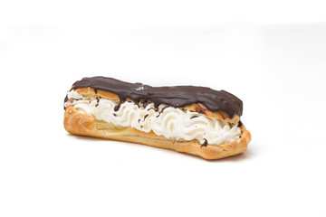 Poured by chocolate, an appetizing eclair on a white background - 194604629
