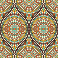 Seamless pattern with ethnic mandala ornament. Hand drawn vector illustration