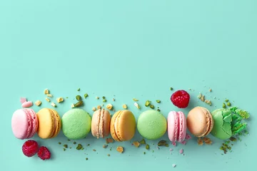 Aluminium Prints Macarons Colorful french macarons on blue background
