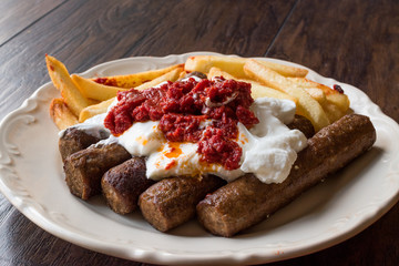 Balkan Cevapcici Kofta / Kofte Kebab with Yogurt, Tomato Sauce and Potatoes