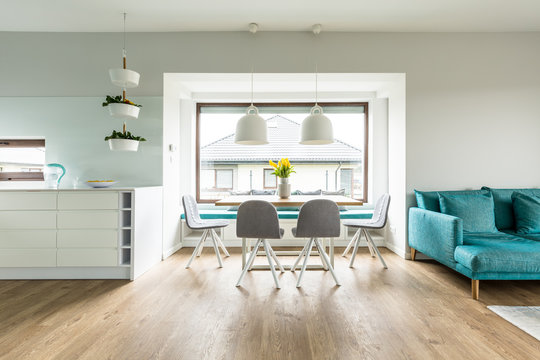 Grey chairs in white apartment