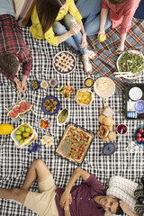 Smiling man relaxing with friends