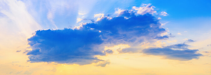 Naklejka na ściany i meble Clouds in sunset sky
