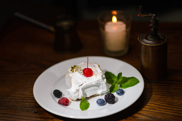 Berry dessert with white cream