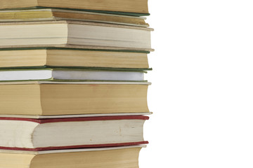 Stack of old closed books, isolated