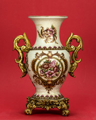 porcelain jug on a red background