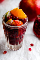 RED WINE CITRUS POMEGRANATE SANGRIA in glasses.