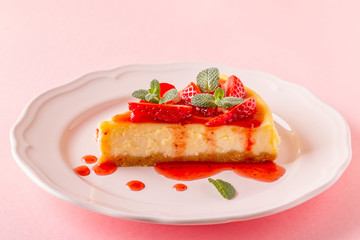 Delicious homemade cheesecake with strawberries.