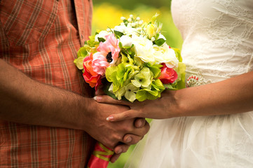 bridal bouquet of bride holding soft focus
