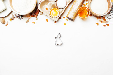 Easter baking ingredients, white food background, top view