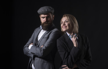 Man and woman in oldfashioned suit and hat