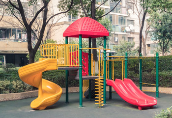 Colorful plastic playground in the courtyard