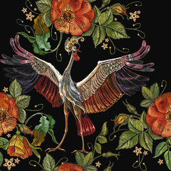 Embroidery crane birds and roses seamless pattern. Template for clothes, textiles, t-shirt design. Classical embroidery, Japanese cranes and red buds of roses art pattern